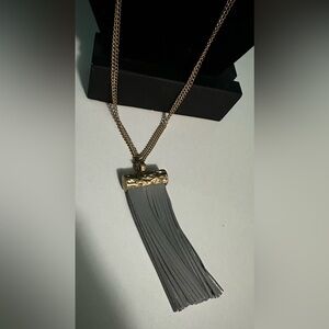 PLUNDER LONG GOLD NECKLACE WITH A GREY FAUX LEATHER DANGLING PENDANT - BRAND NEW